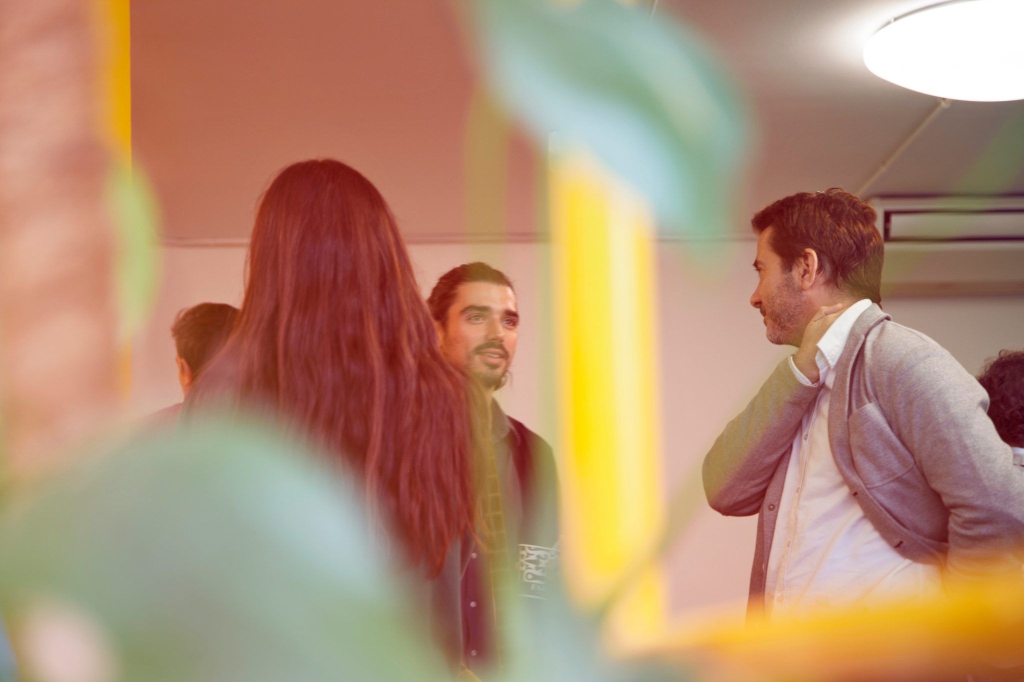 people in meeting listening